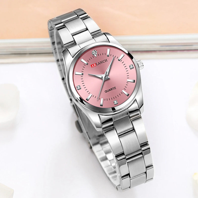 Elegância atemporal: Relógio minimalista de aço inoxidável com strass rosa de 29 mm - Perfeito para mulheres modernas e aventuras ao ar livre.